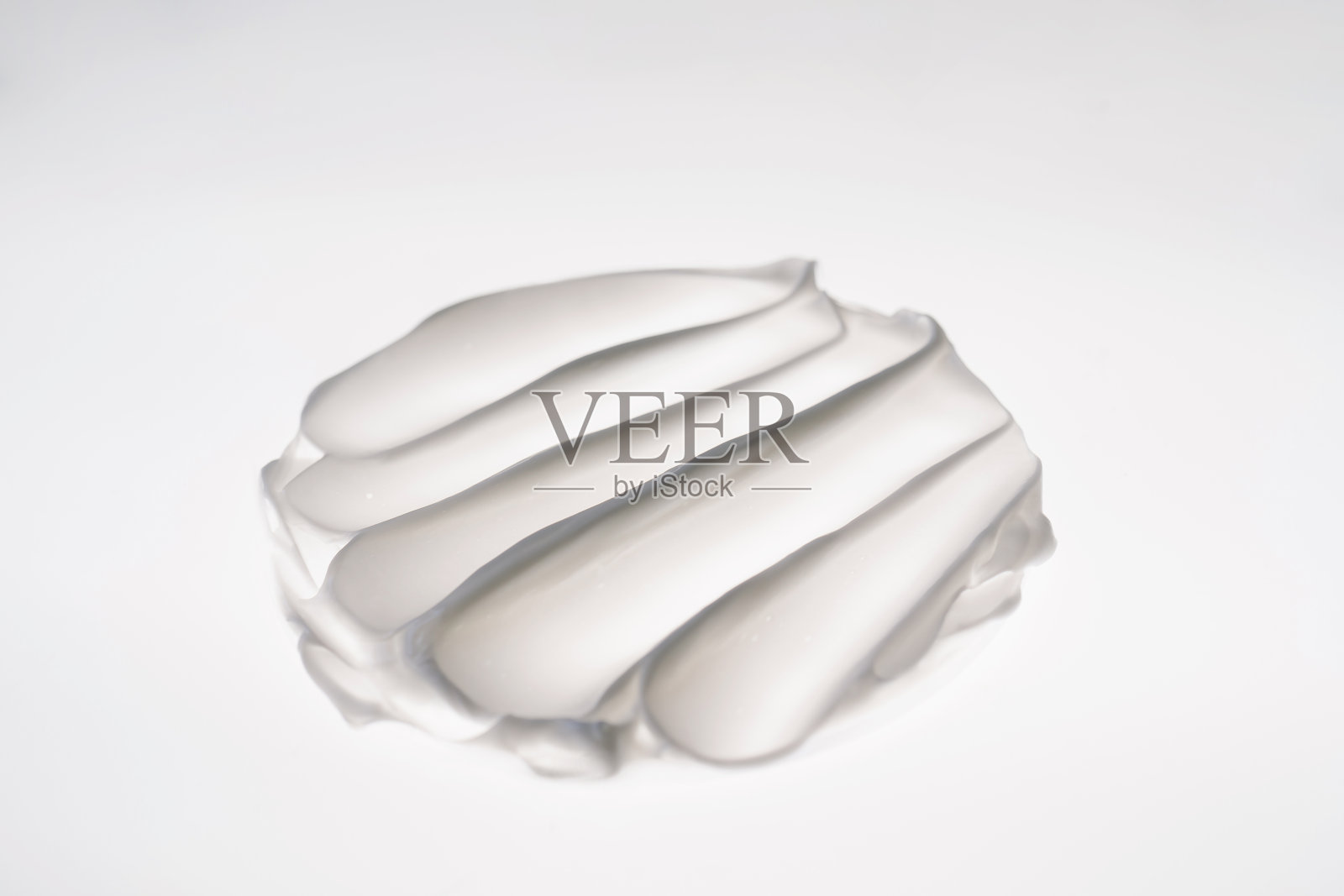 白色背景上的白色奶油纹理。照片摄影图片