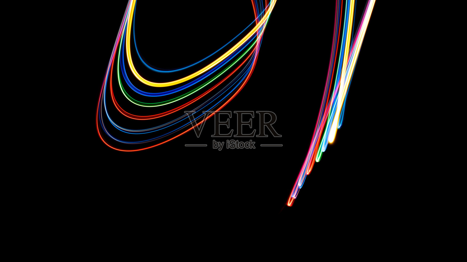 在黑色背景上发光的多色波浪线照片摄影图片