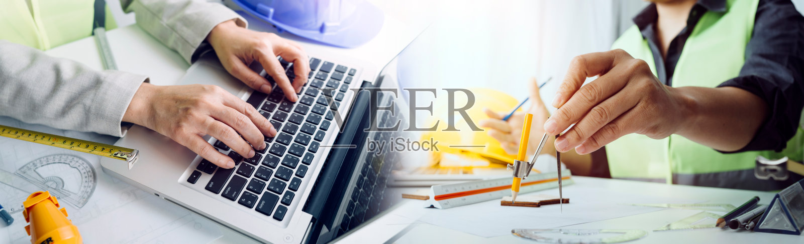 建筑师工作蓝图，工程师检查工作场所的建筑计划，素描一个建设项目，选择性重点。照片摄影图片