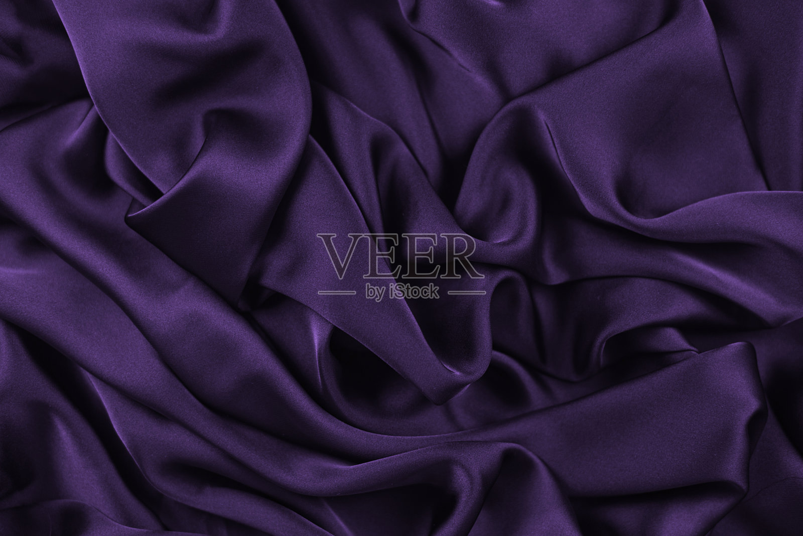 丝绸或绸缎质地的豪华织物可以用作抽象的背景。前视图。照片摄影图片