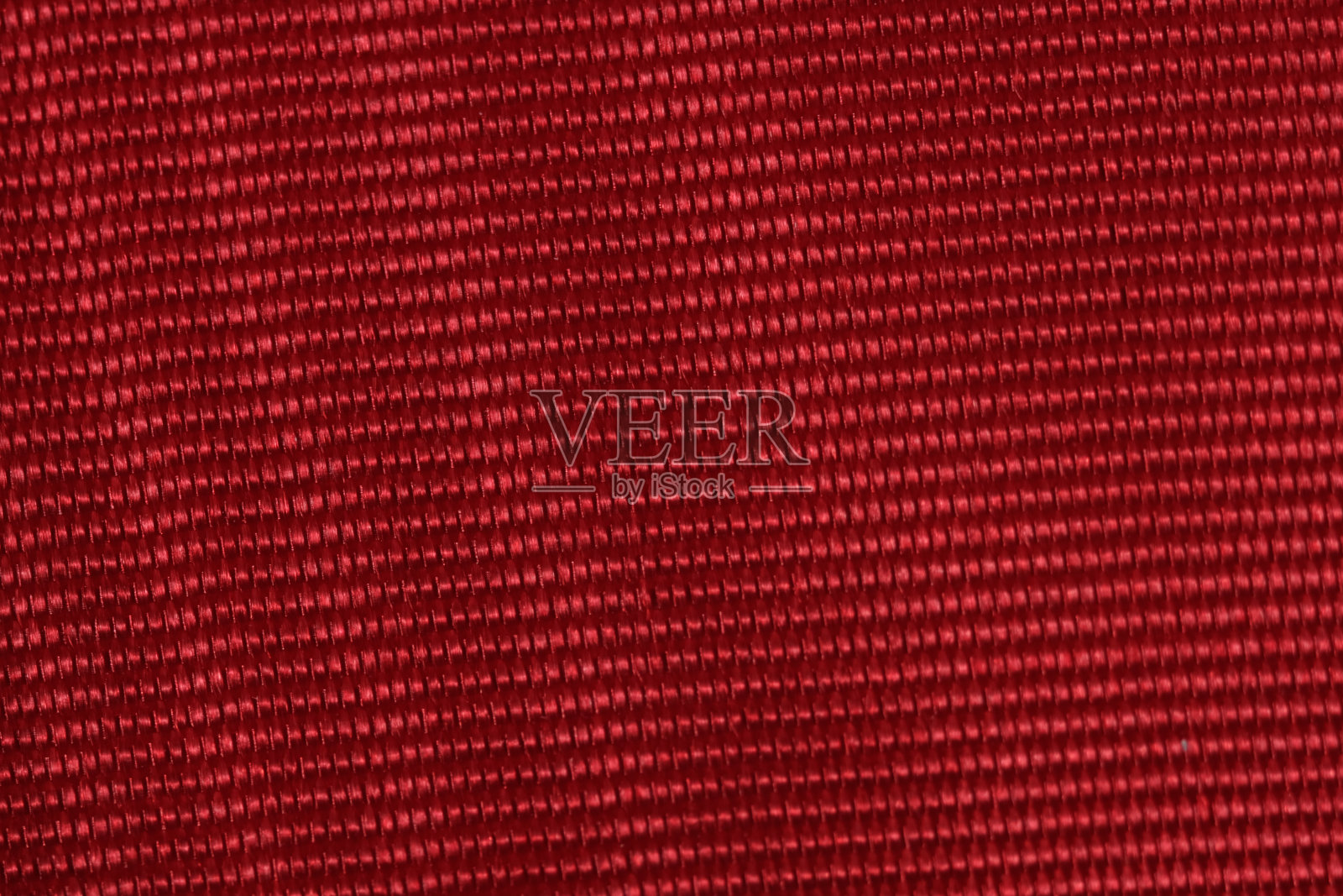 真丝面料纹理背景为红色。照片摄影图片