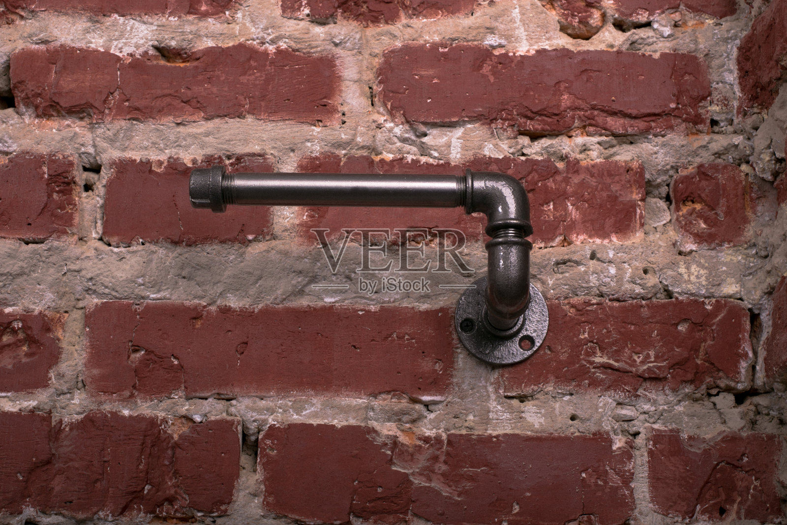 金属支架厕纸，毛巾，砖墙照片摄影图片