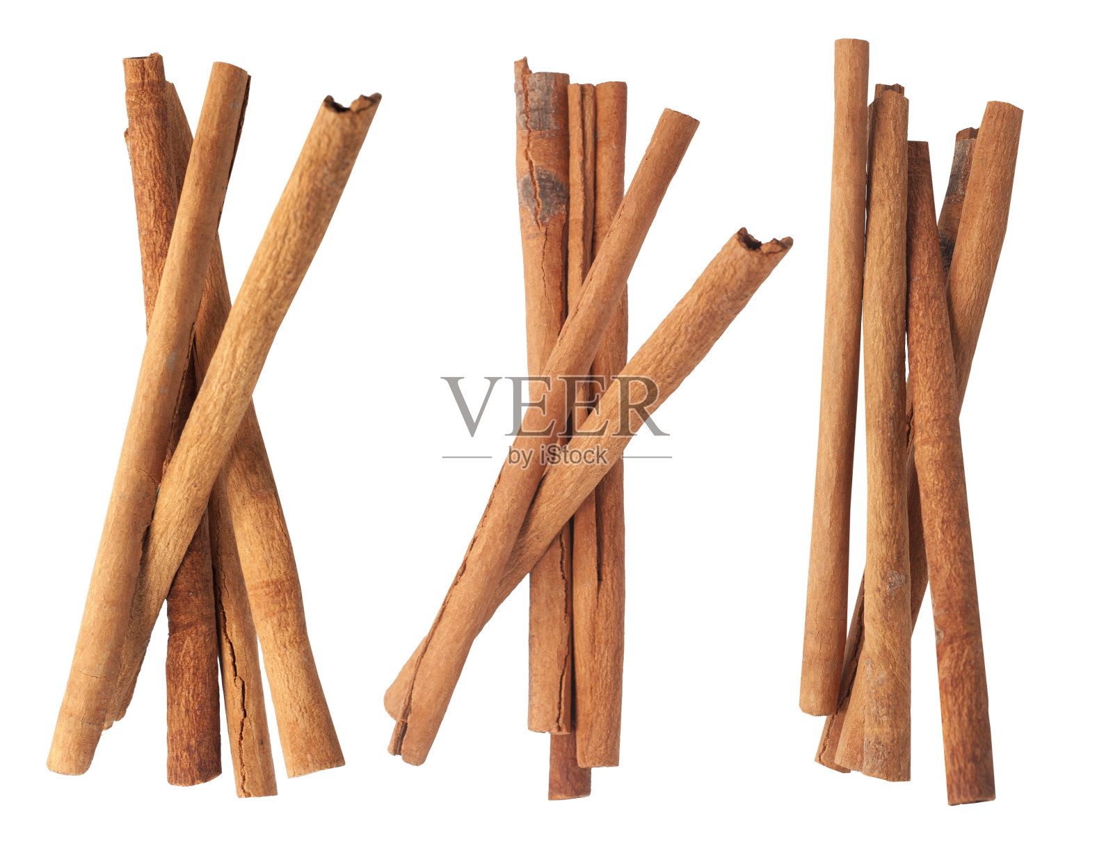 在白色背景上分离的肉桂照片摄影图片