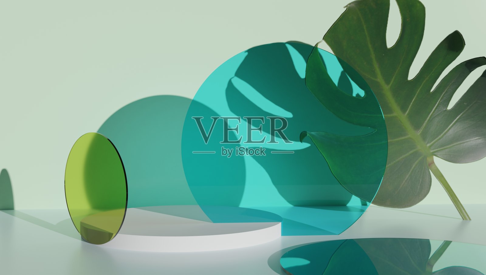 玻璃柱体基座，绿色背景的产品展示架照片摄影图片