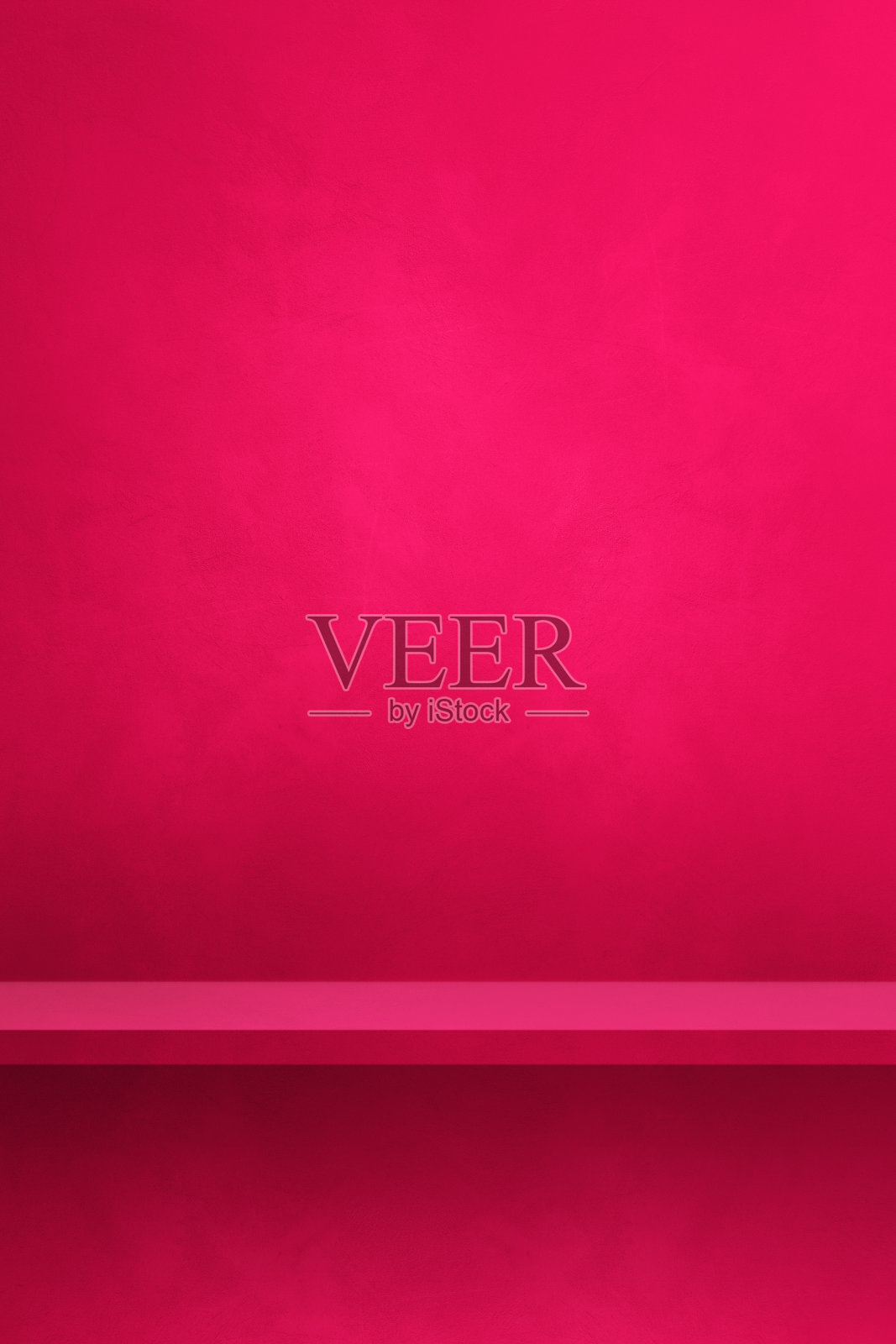 粉红色墙上的空架子。背景模板。垂直的背景照片摄影图片