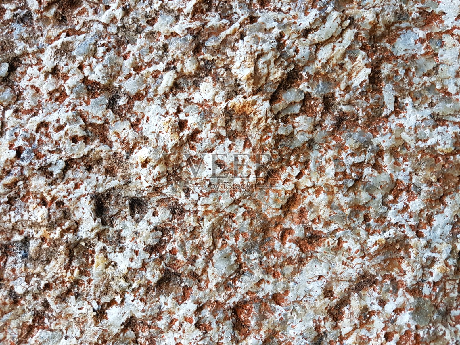 粗糙岩石在地表的抽象背景照片摄影图片