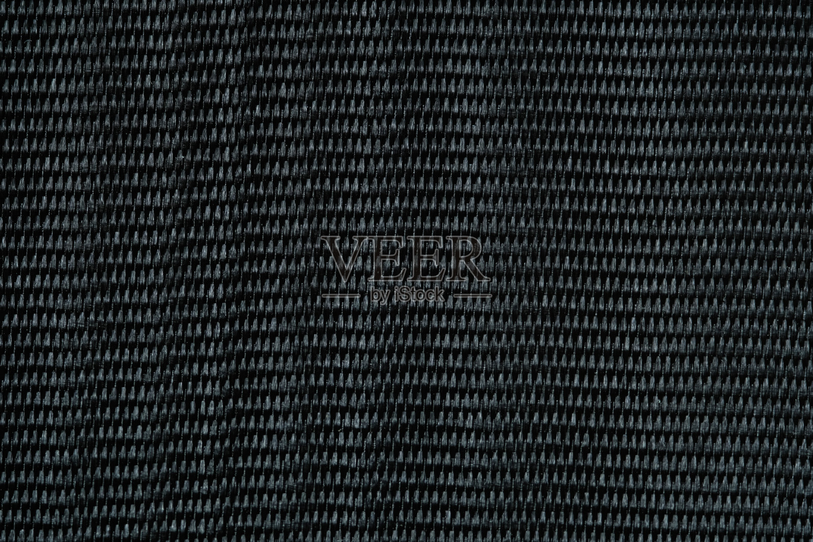 黑色真丝面料纹理背景。照片摄影图片