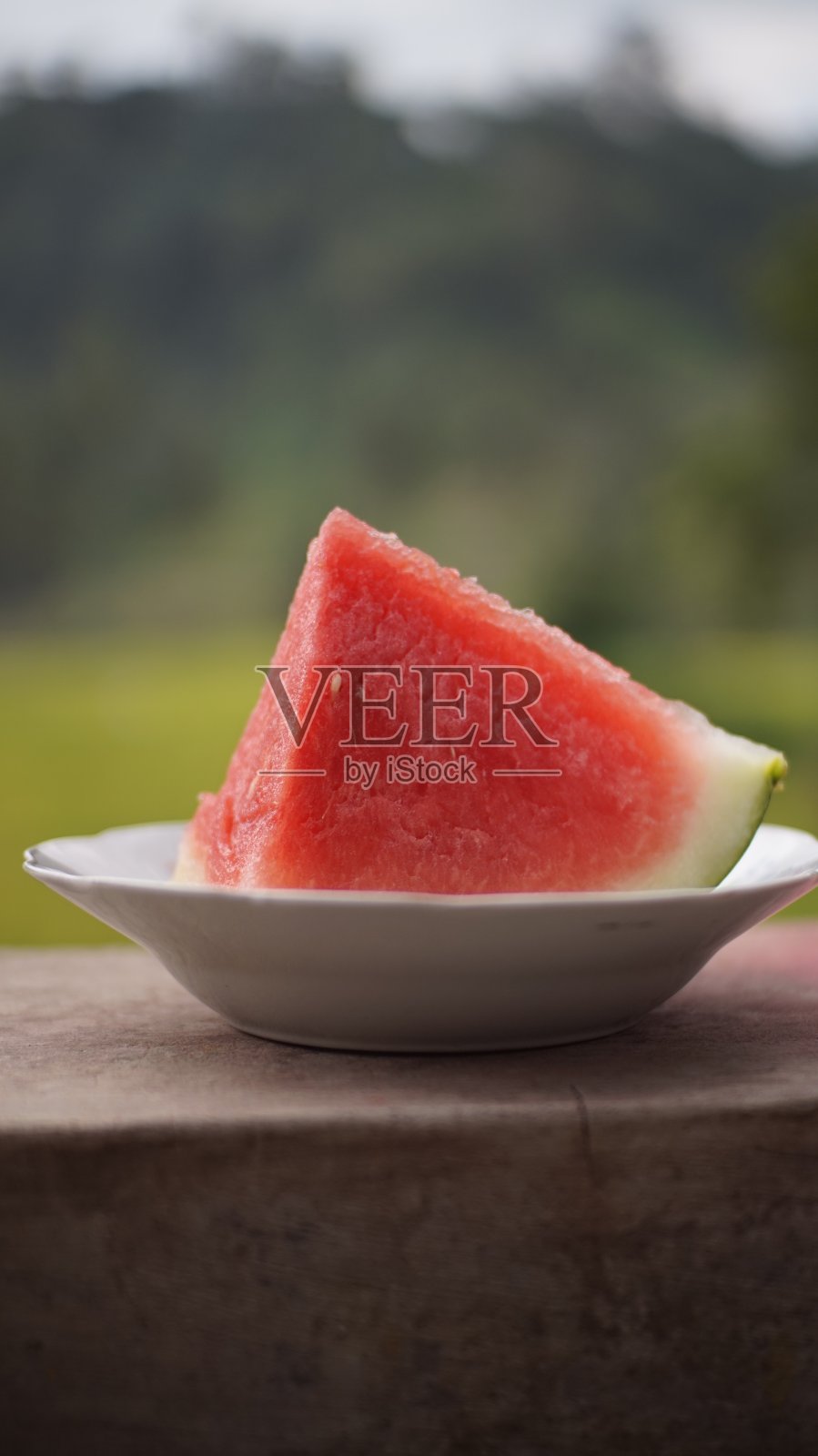 鲜红西瓜，以自然为背景照片摄影图片