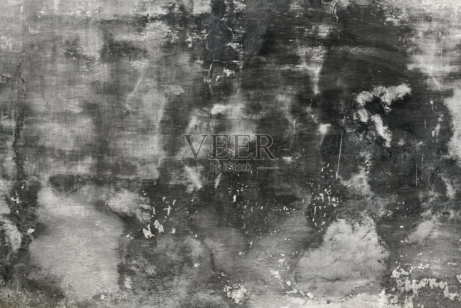 抽象的灰色油漆旧墙的背景或纹理，剥落的油漆和灰泥裂缝像垃圾风格照片摄影图片