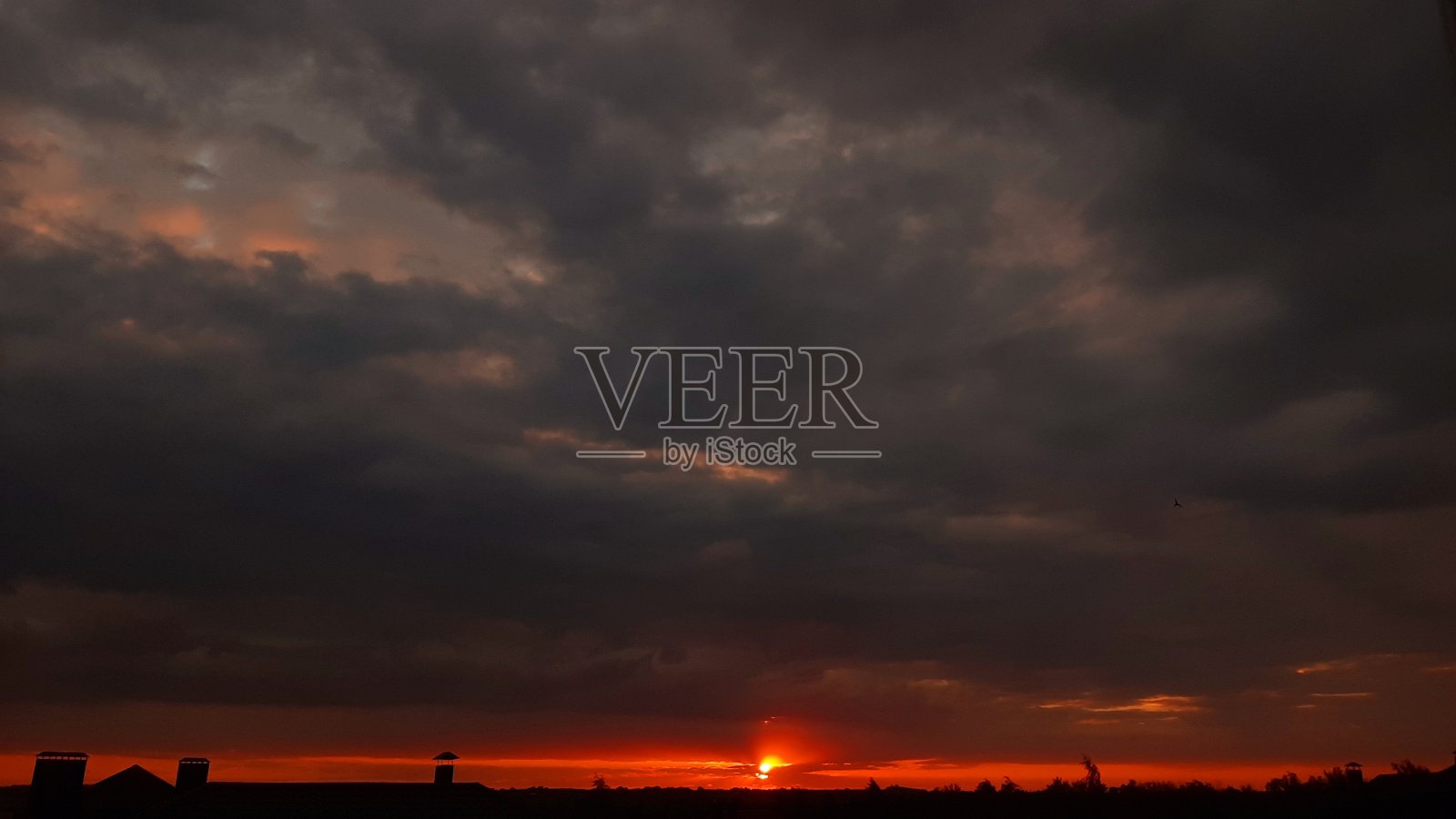 血腥的日落照片摄影图片