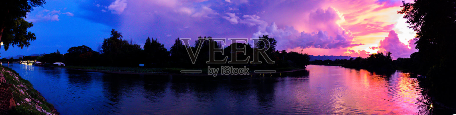 泰国北碧府河上的日落照片摄影图片