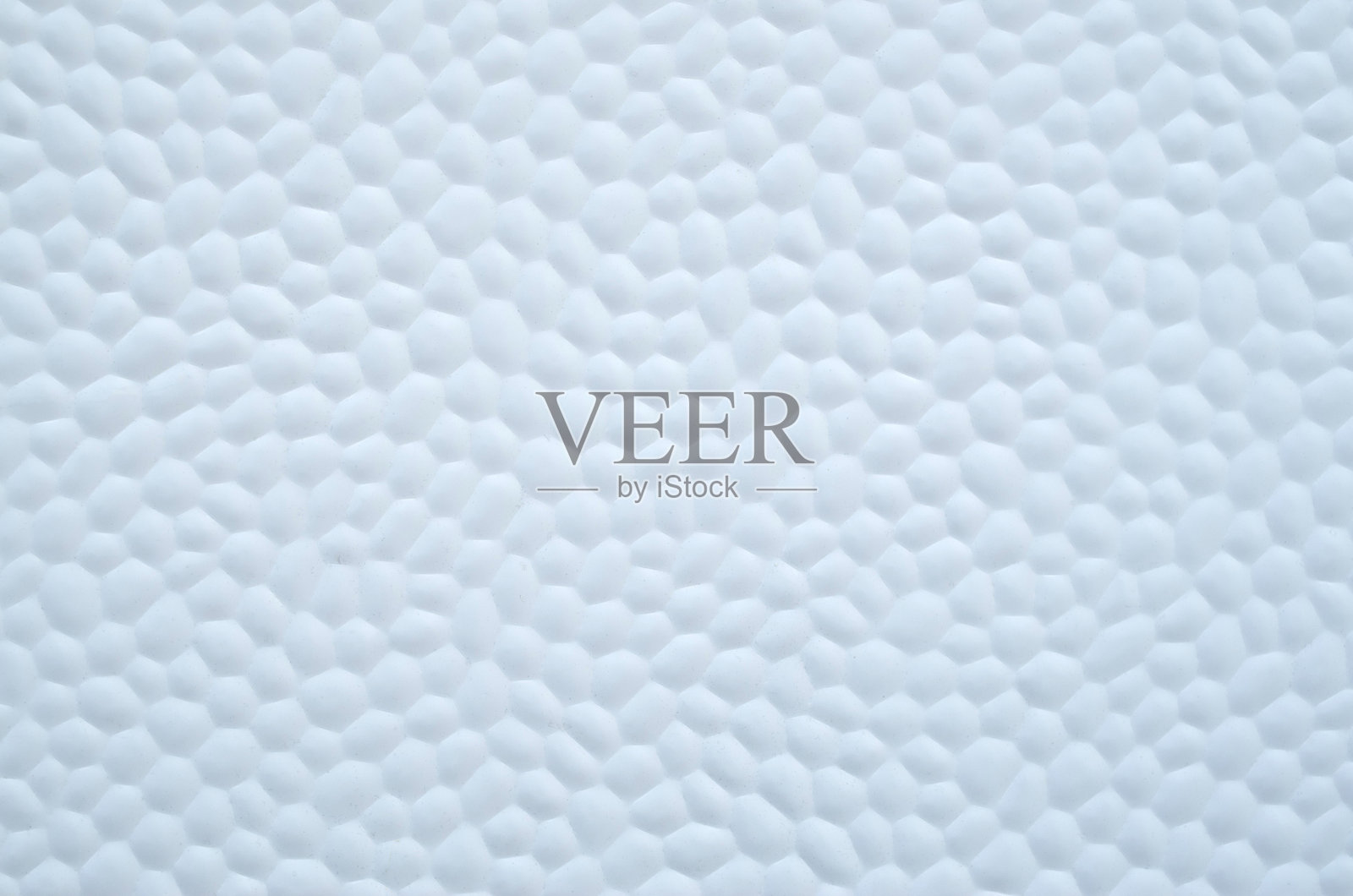 白色装饰塑料表面覆盖小六边形特写照片摄影图片