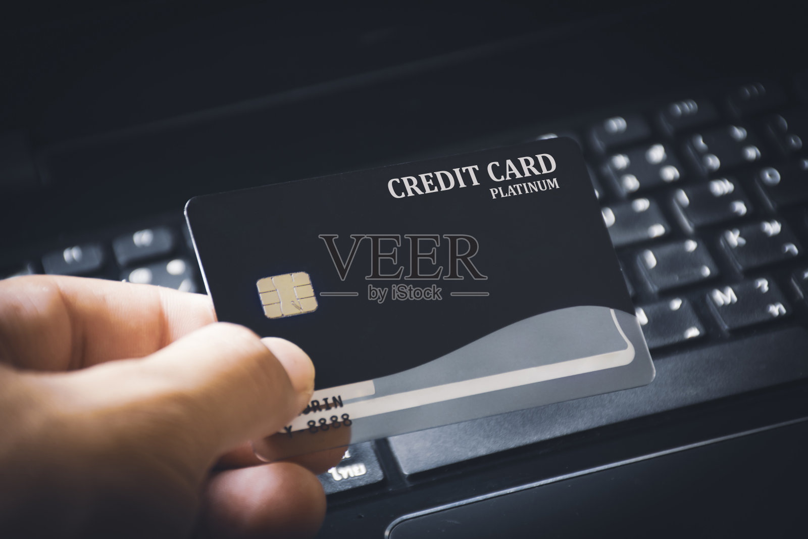 信用卡保费在手照片摄影图片