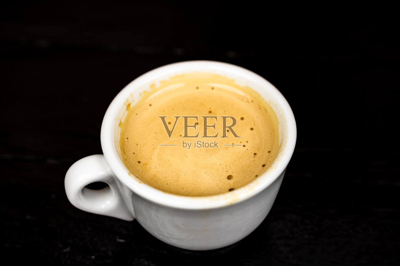 咖啡杯细节。浓缩咖啡来了照片摄影图片