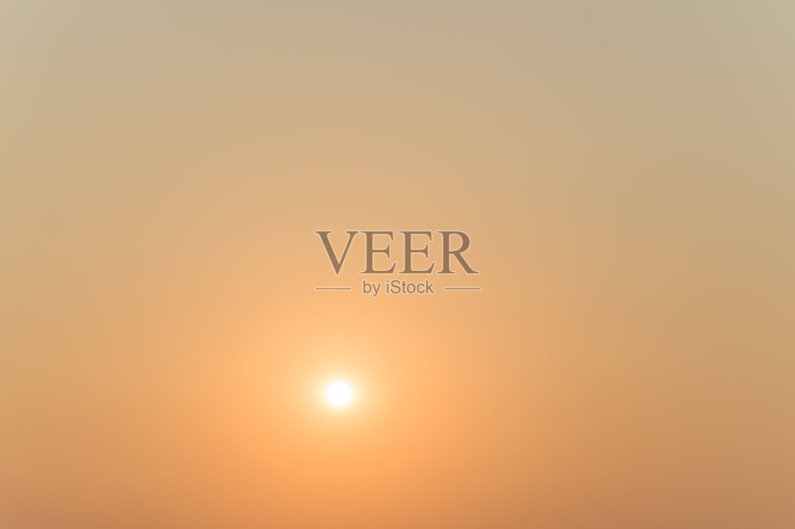 橙色的背景是早晨升起的太阳照片摄影图片