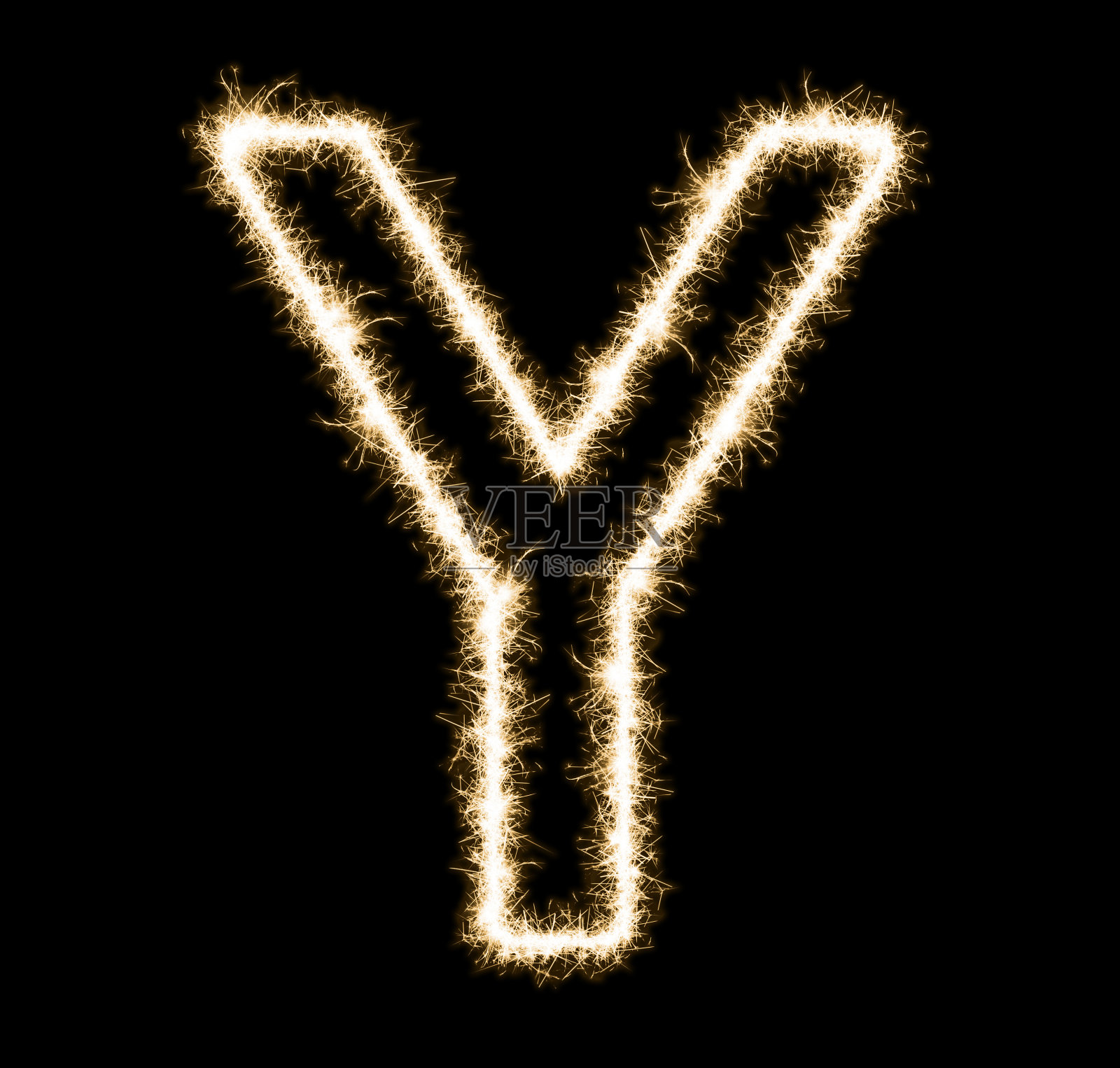 字母Y -由火花组成，孤立在黑色上照片摄影图片