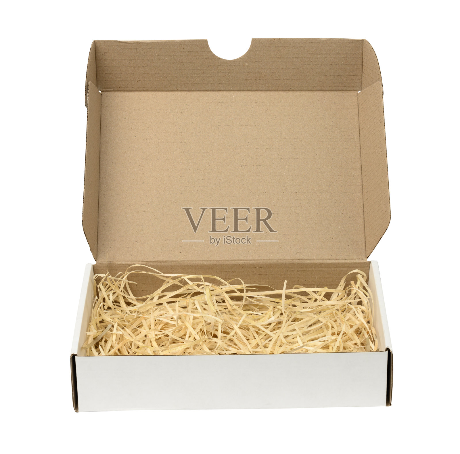 里面有锯末的长方形打开的瓦楞纸盒。包装照片摄影图片