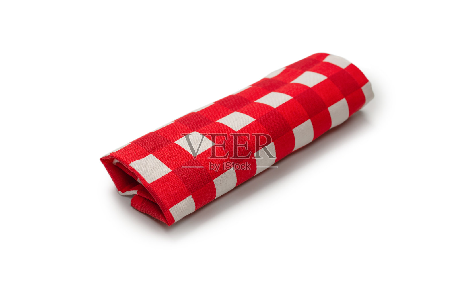 红色的餐巾孤立在白色的背景上。照片摄影图片