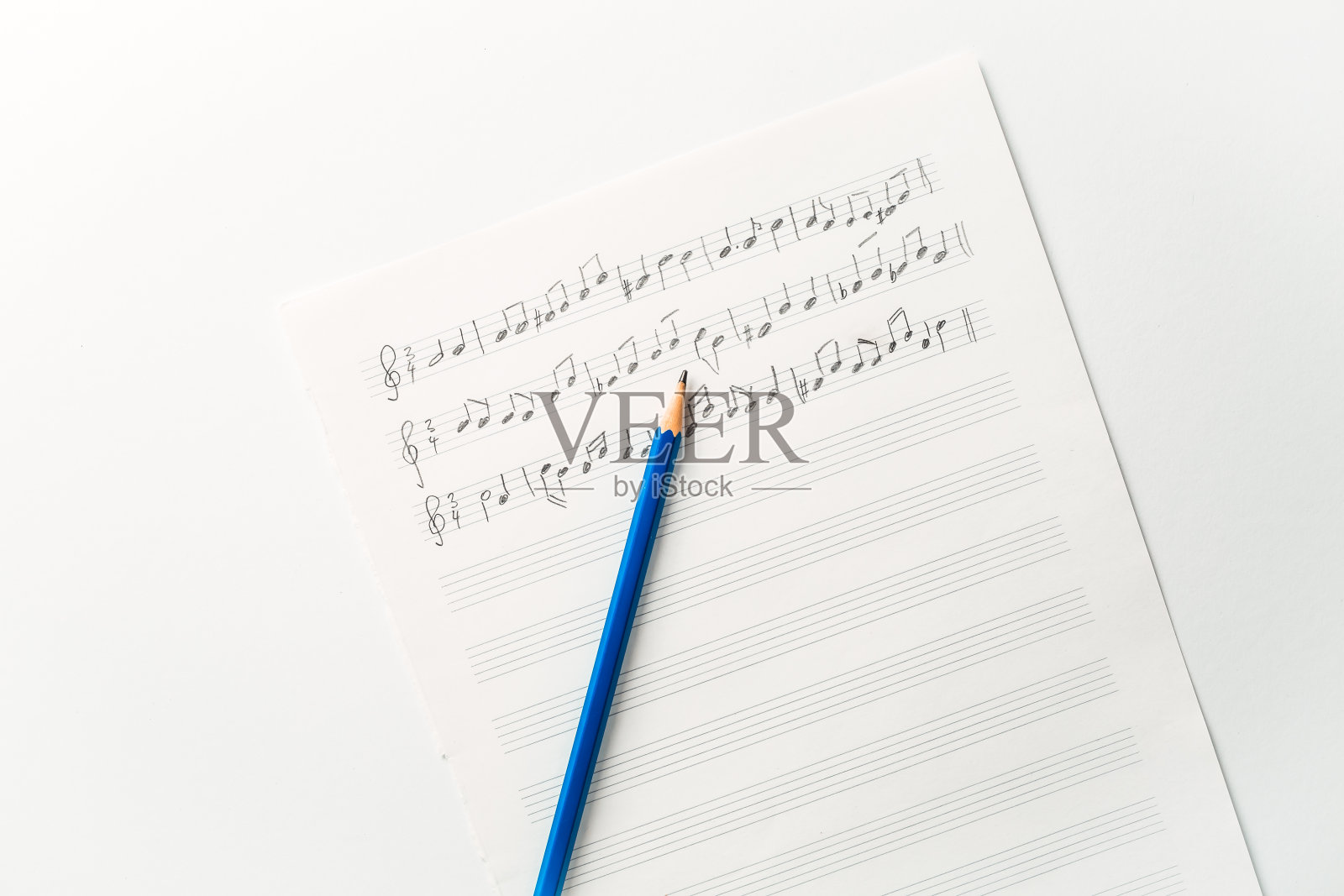 用铅笔乱写乐谱照片摄影图片