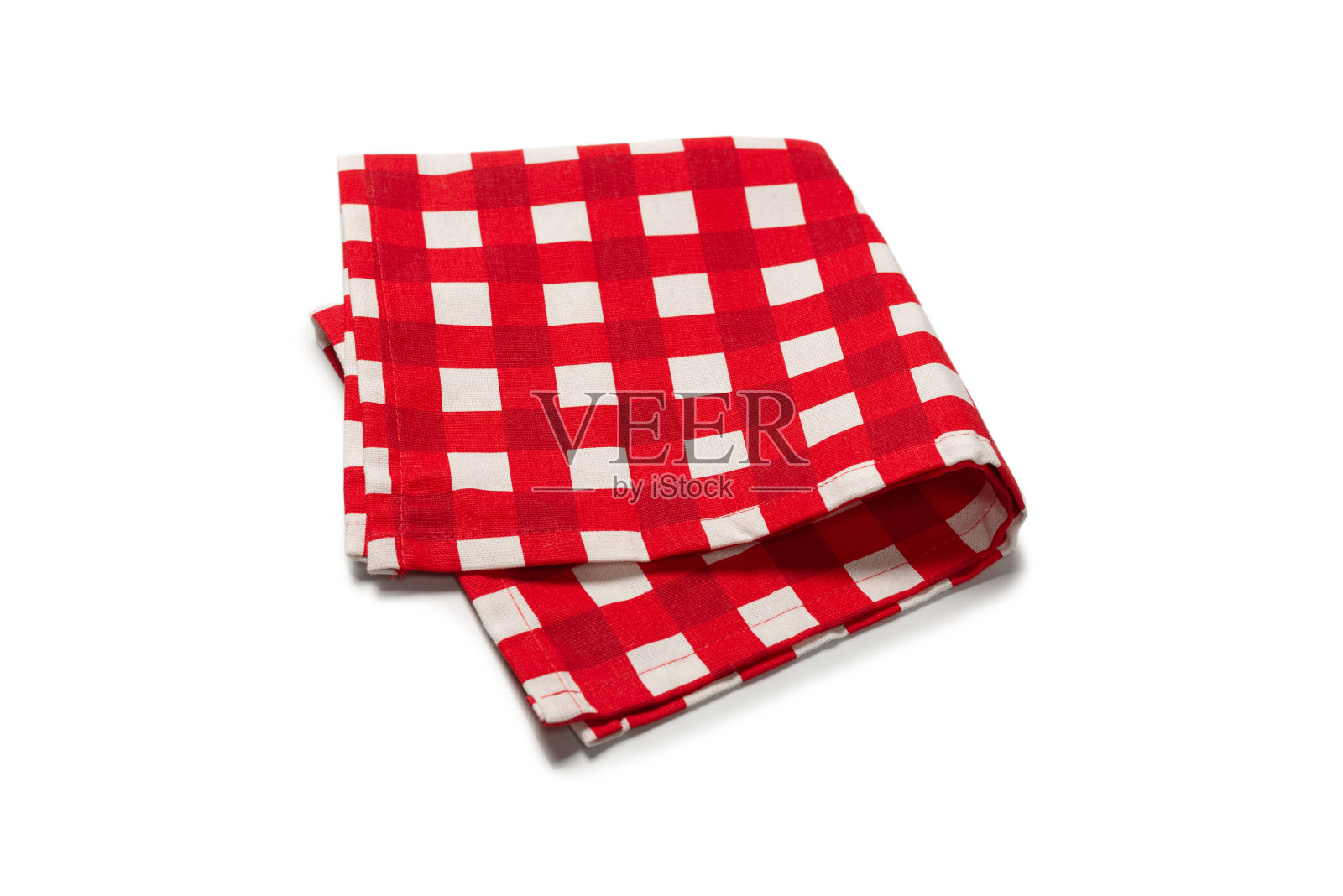 红色的餐巾孤立在白色的背景上。照片摄影图片