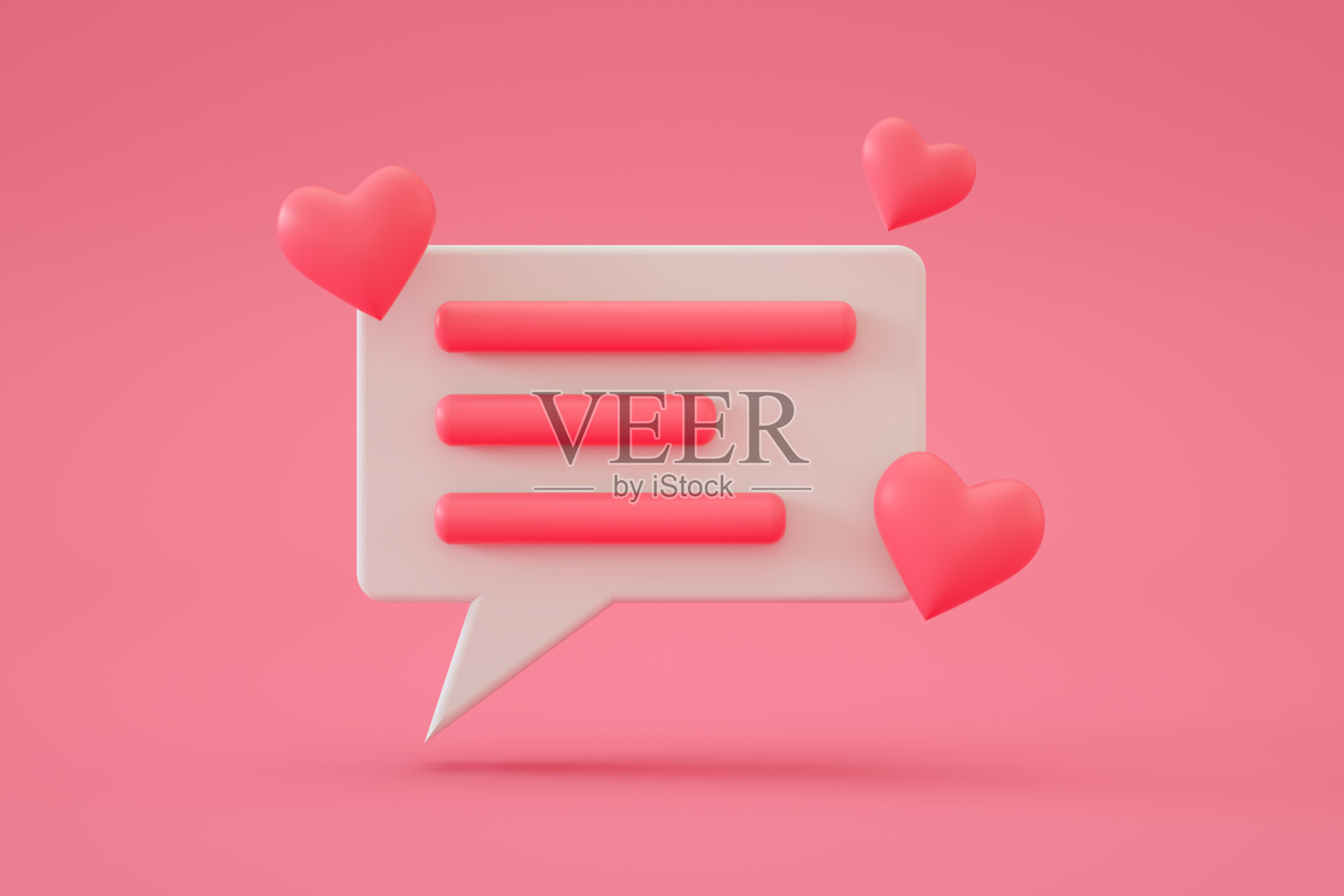 粉红色背景上的心形语音气泡照片摄影图片