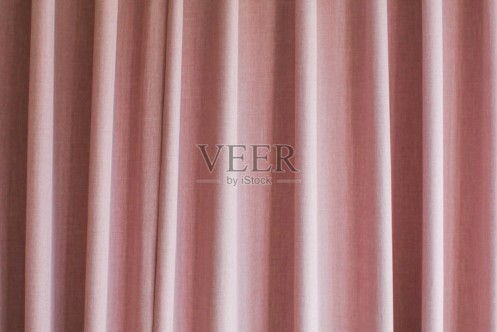 粉红色丝缎窗帘窗帘背景介绍。戏剧或其他娱乐主题照片摄影图片