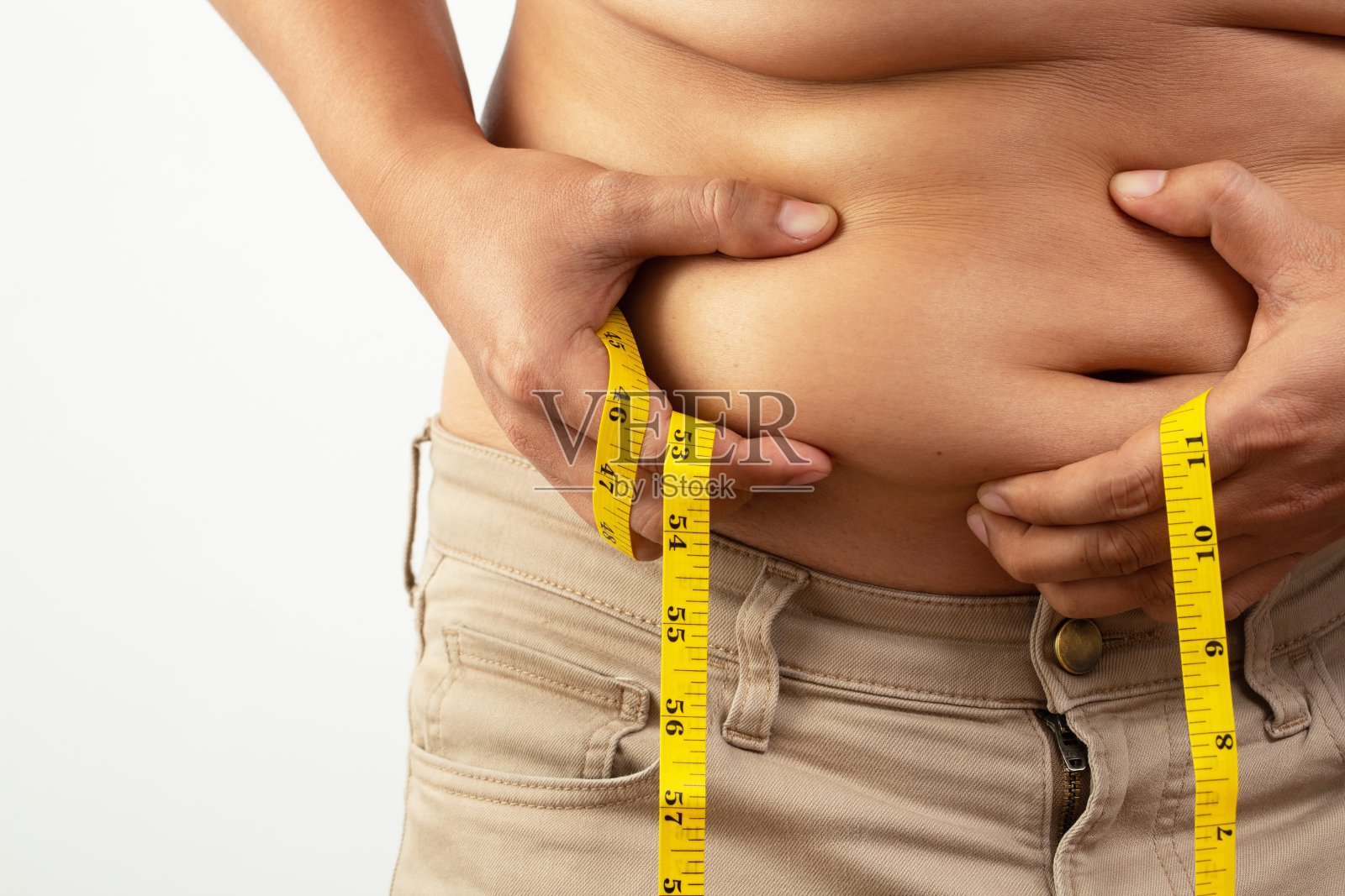 肥胖是导致糖尿病和高血压的原因。照片摄影图片