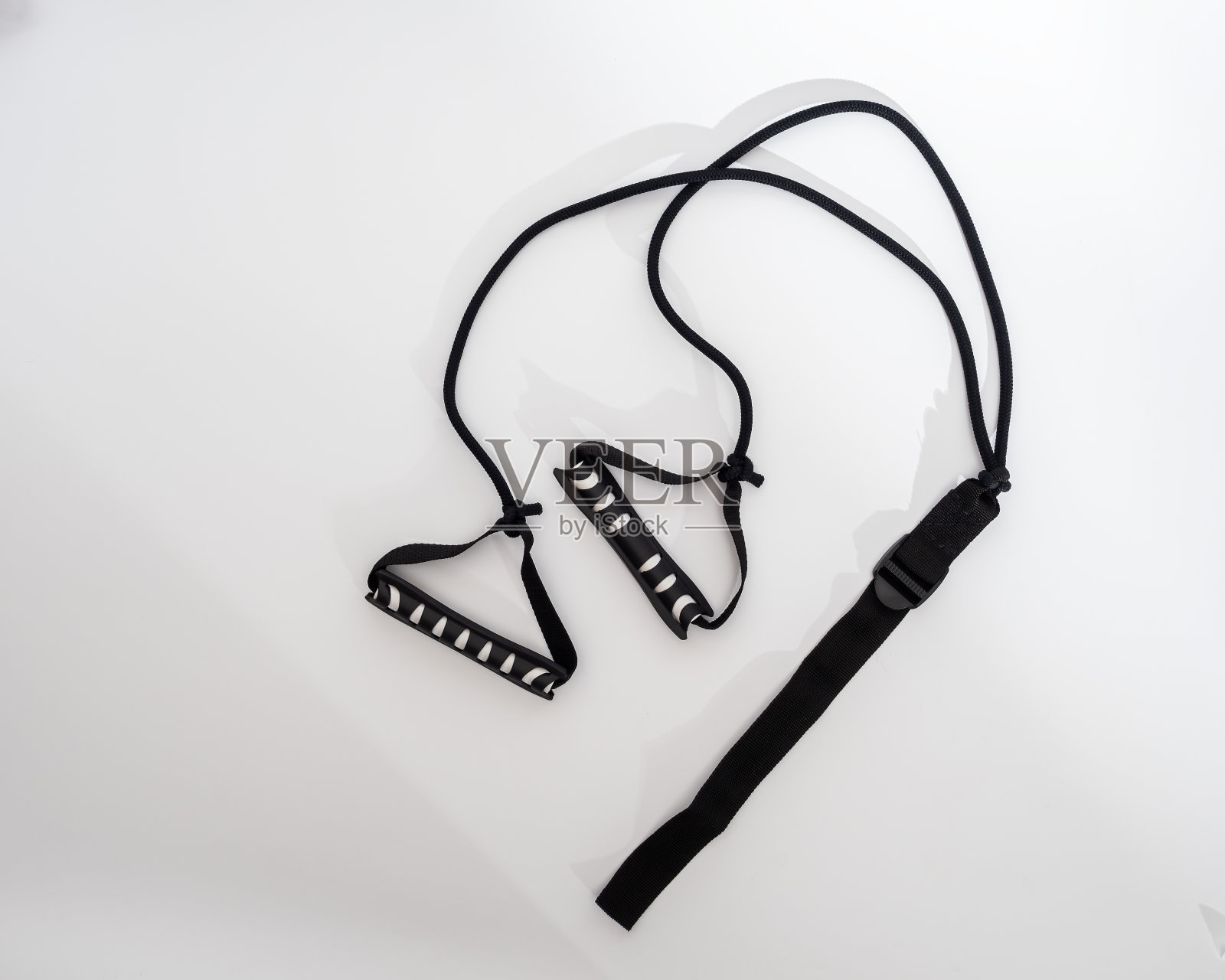 滑雪者-拳击手扩展器-多功能教练在一个白色的背景照片摄影图片