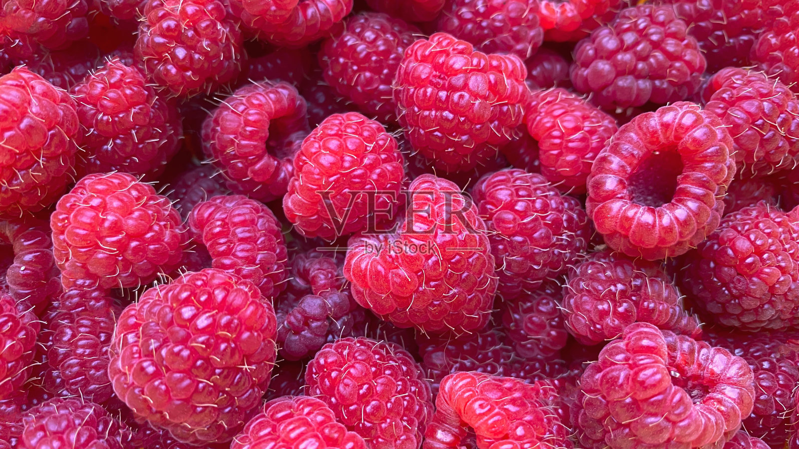 纹理背景来自大量的覆盆子照片摄影图片