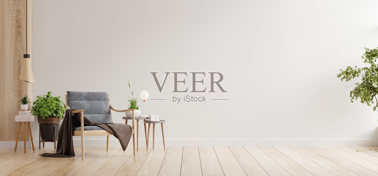 客厅极简的室内设计，白色墙壁上有扶手椅和桌子。照片摄影图片