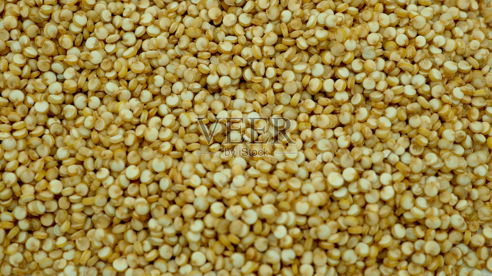 天然白藜麦是健康食品。高纤维和蛋白质，维生素，无麸质和非常高的抗氧化剂。照片摄影图片