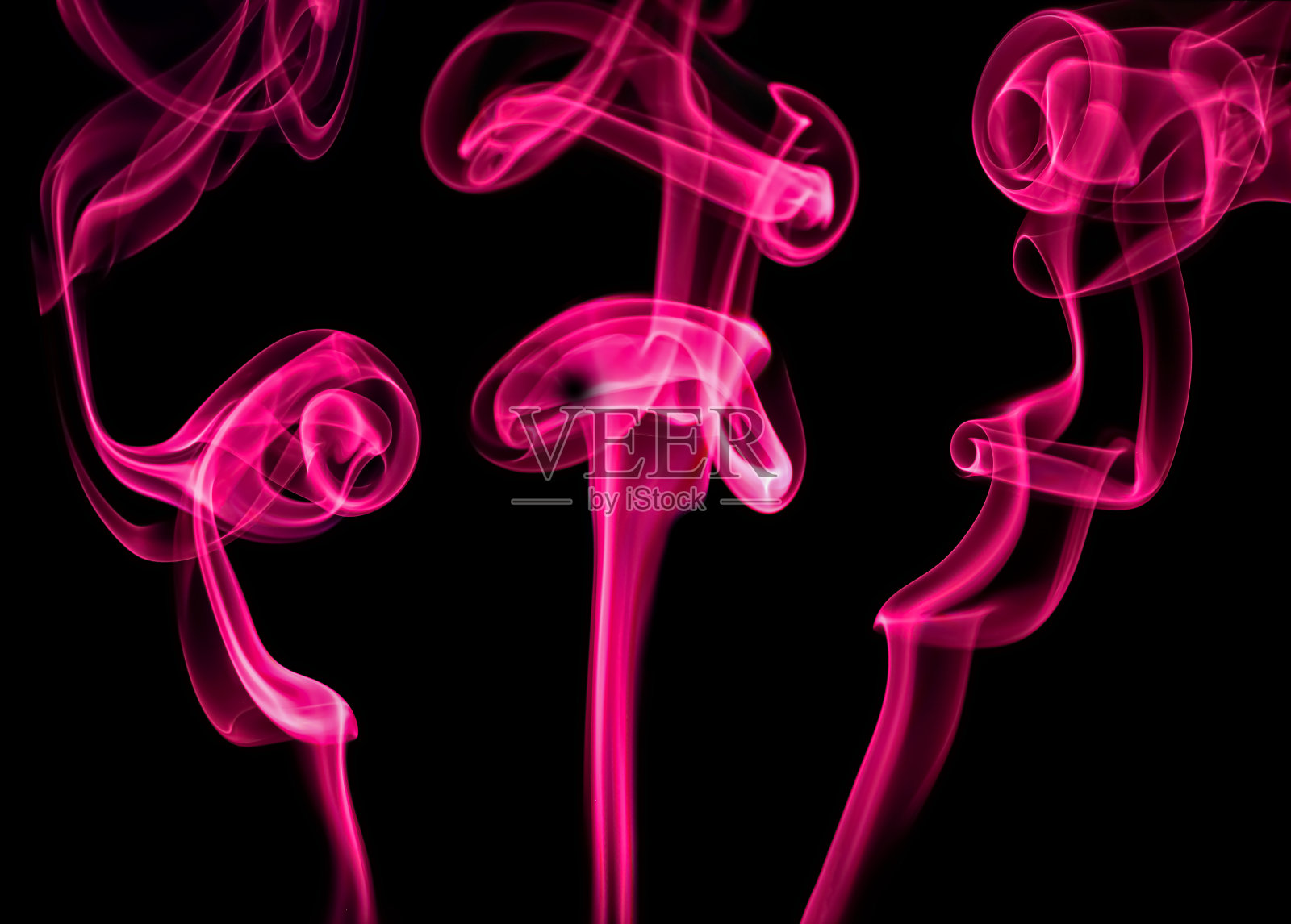 粉红色的烟雾旋转着照片摄影图片