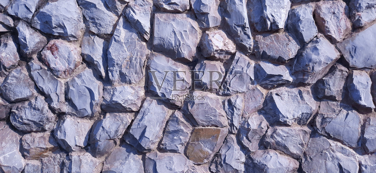 石头墙。照片摄影图片