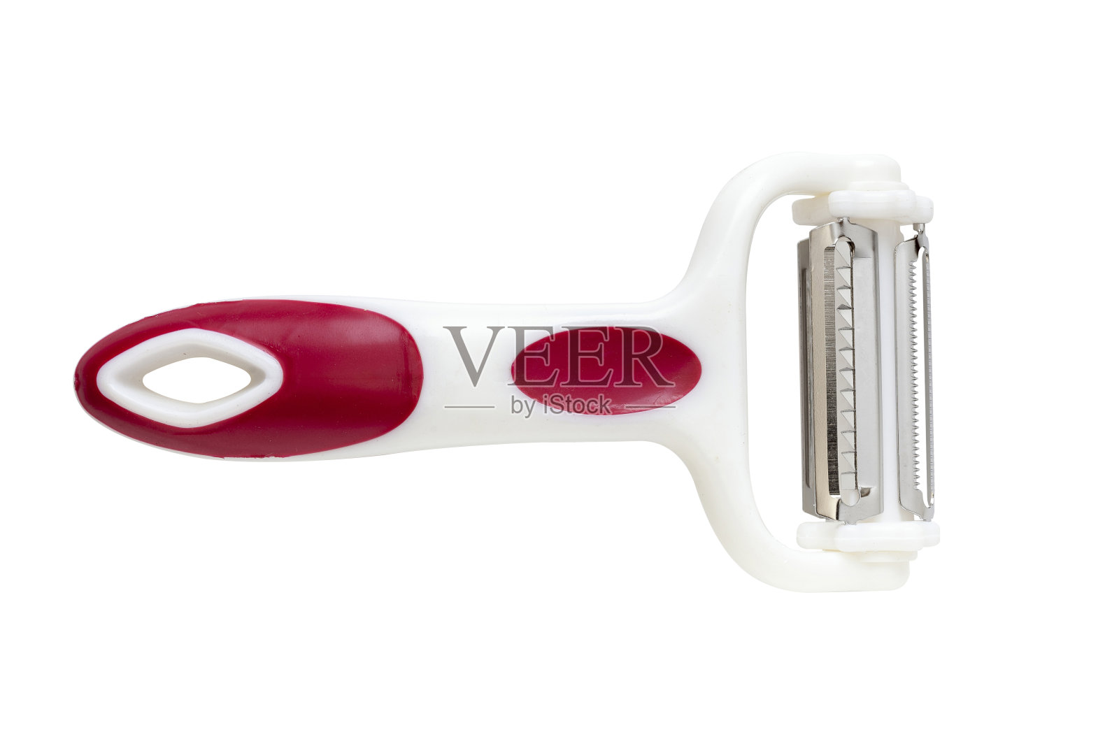 通用、多功能果蔬削皮机。照片摄影图片