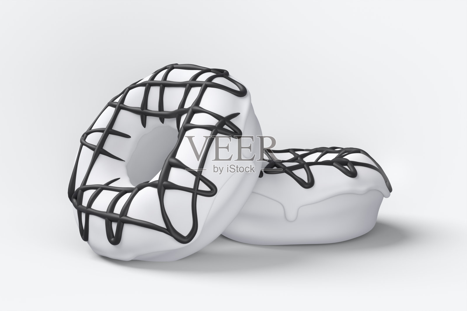 一套飞行单色甜甜圈与黑色洒在白色背景照片摄影图片