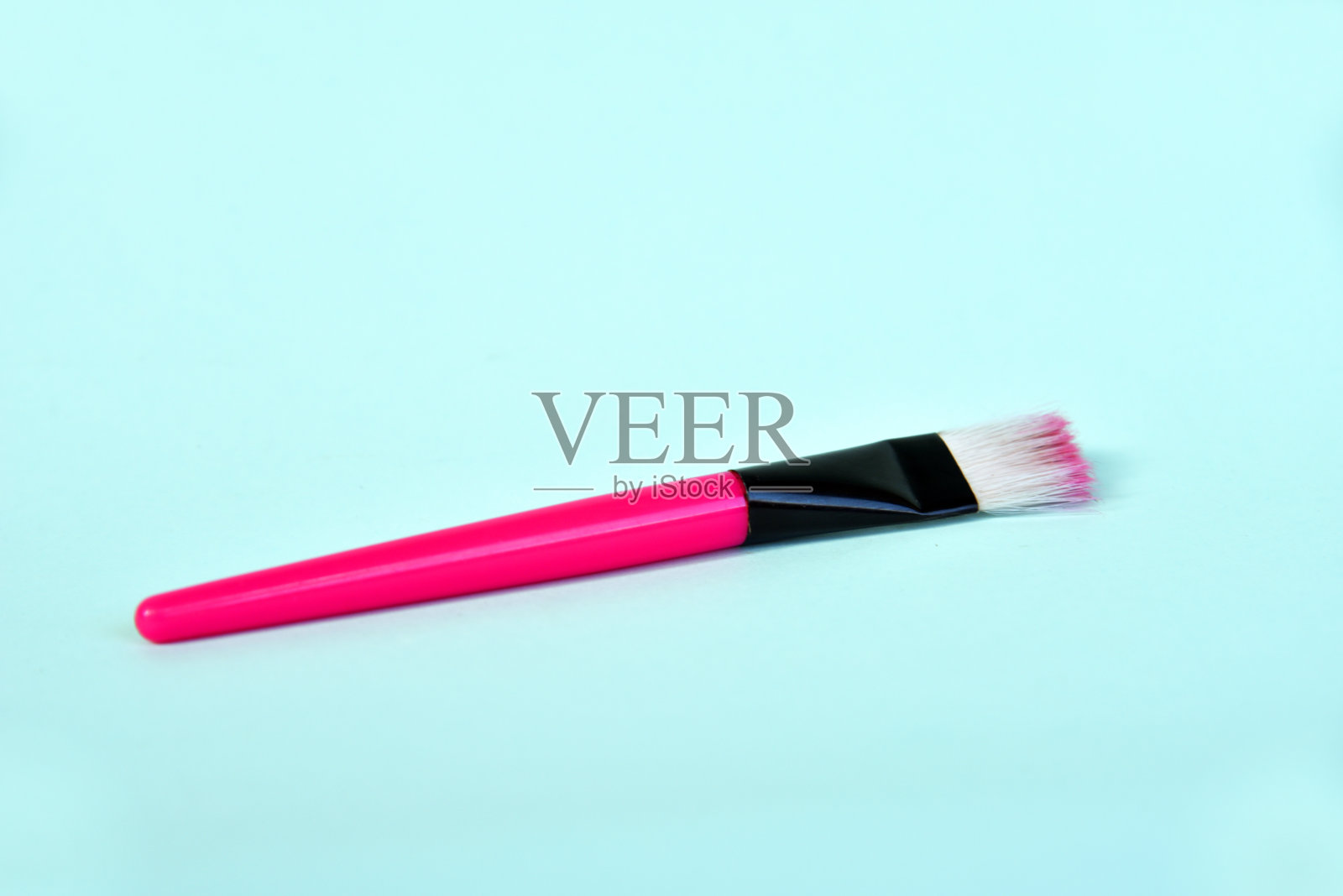 脸刷粉红色隔离的颜色背景照片摄影图片