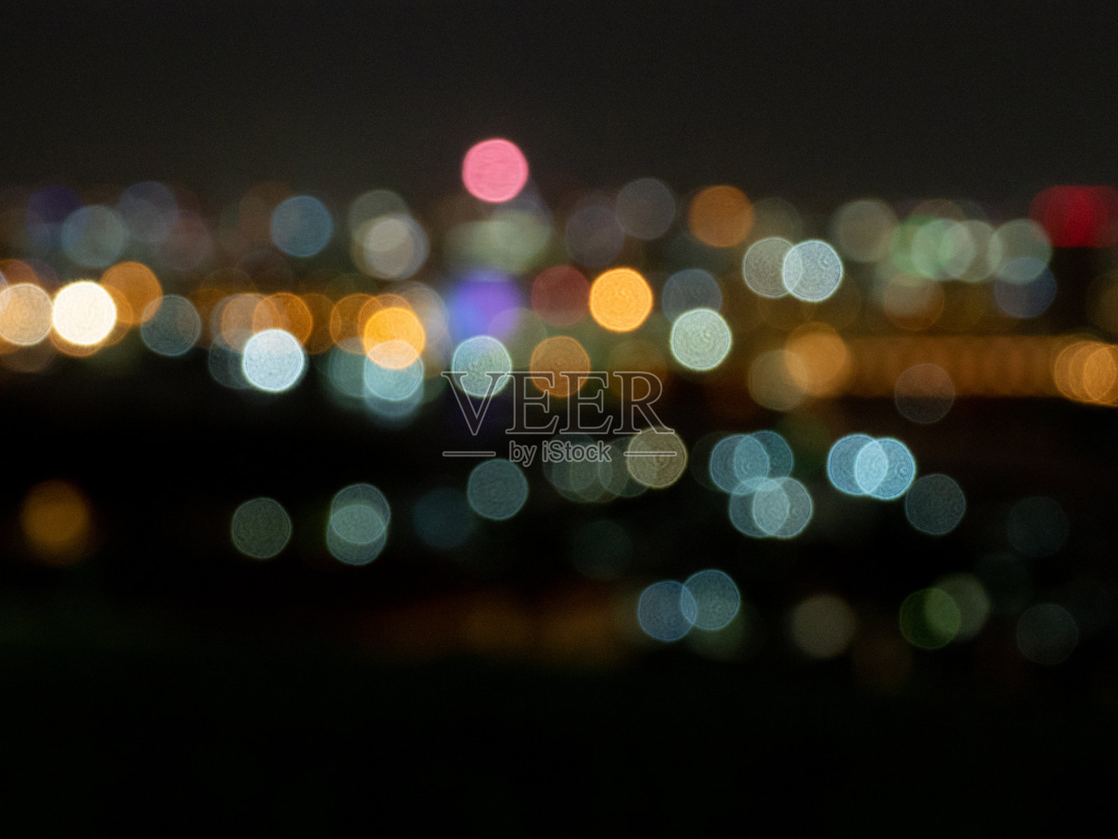 彩色模糊抽象的散景背景。照片摄影图片