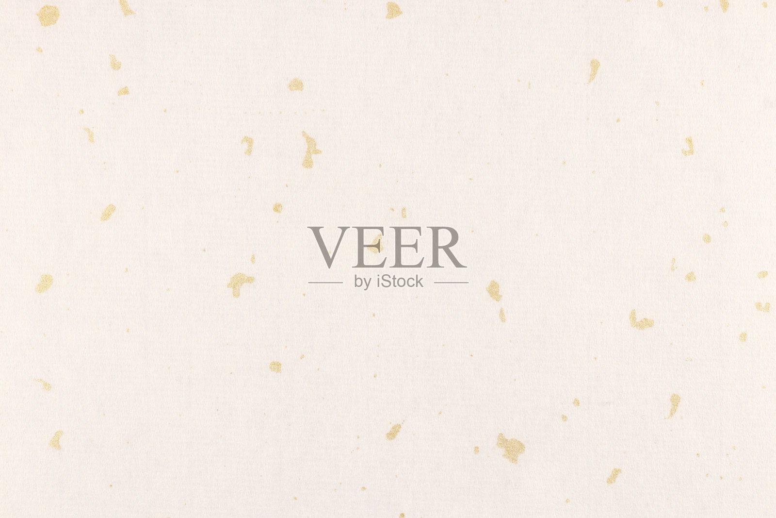 奶油与金色斑点装饰纸纹理。金色污渍装饰纸背景。景观水平方向。照片摄影图片