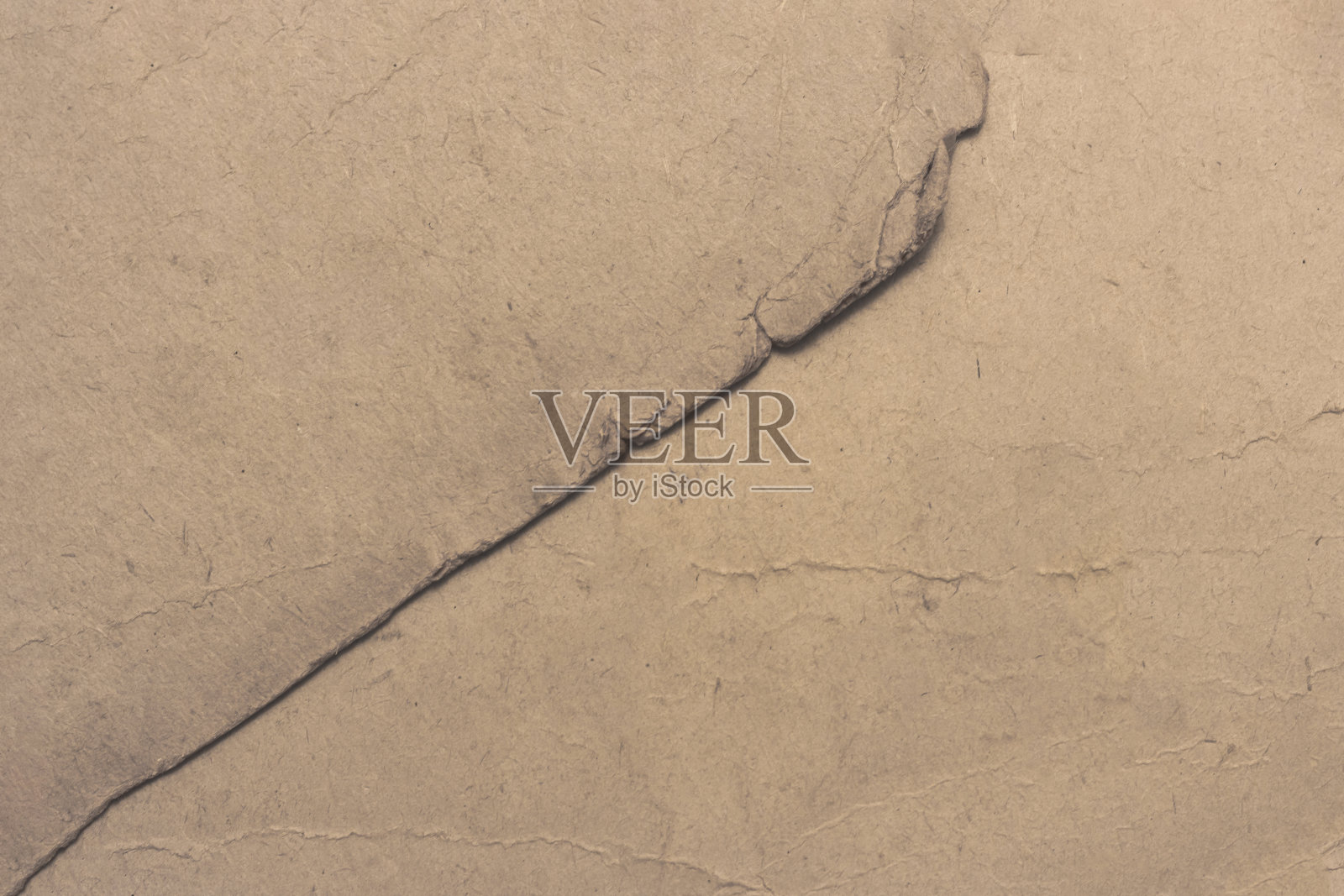 旧的发黄的纸，满是污迹。照片摄影图片