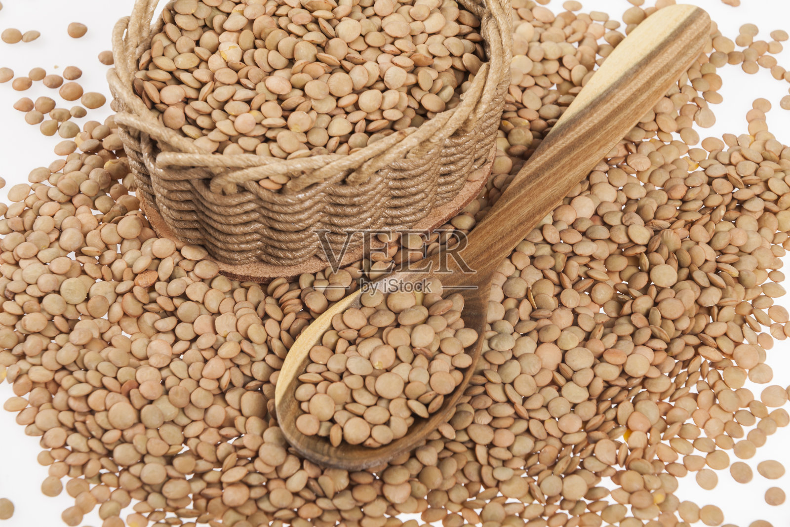 非常健康的食物;生棕色扁豆堆照片摄影图片