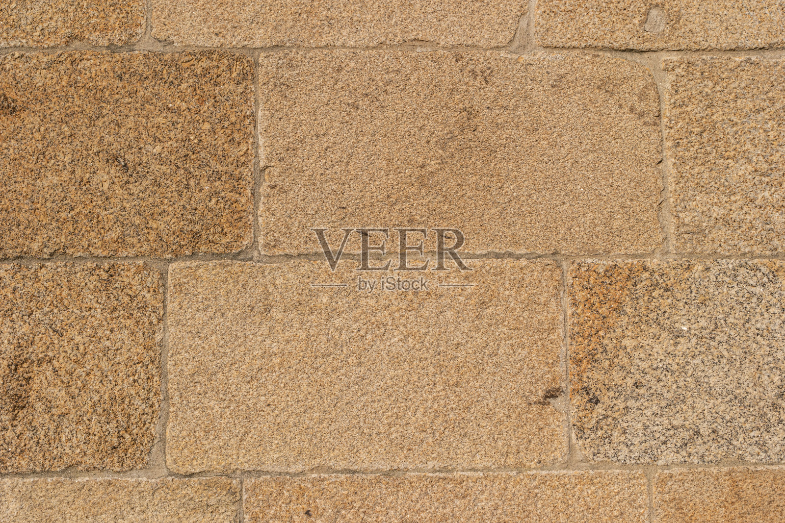 石墙的纹理作为背景或纹理的石墙。大理石纹理装饰砖、天然石材制成的墙砖。花岗岩。建筑材料照片摄影图片