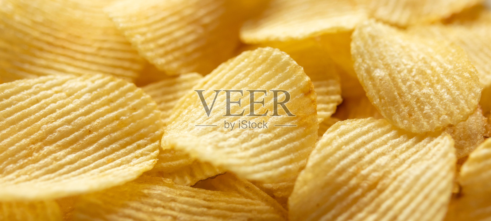 酥脆金黄薯片小吃质地背景照片摄影图片