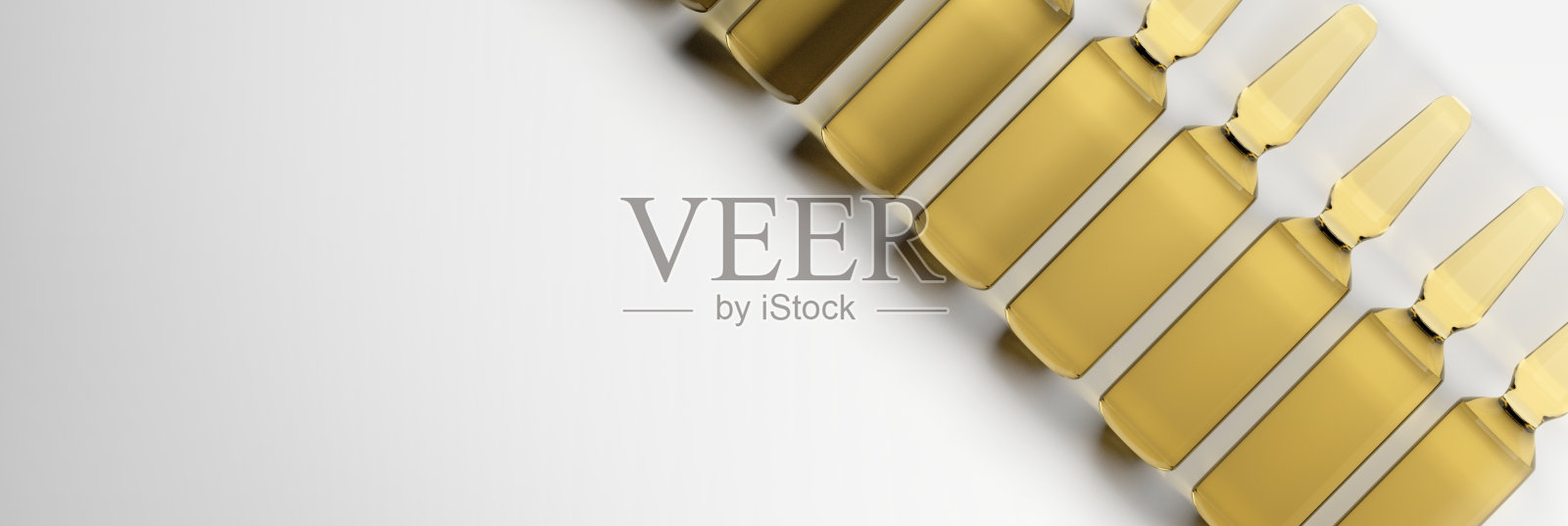 宽网横幅琥珀色玻璃安瓿和复制空白照片摄影图片