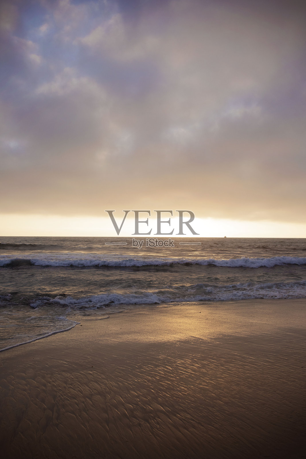 温丹西海滩的日落照片摄影图片