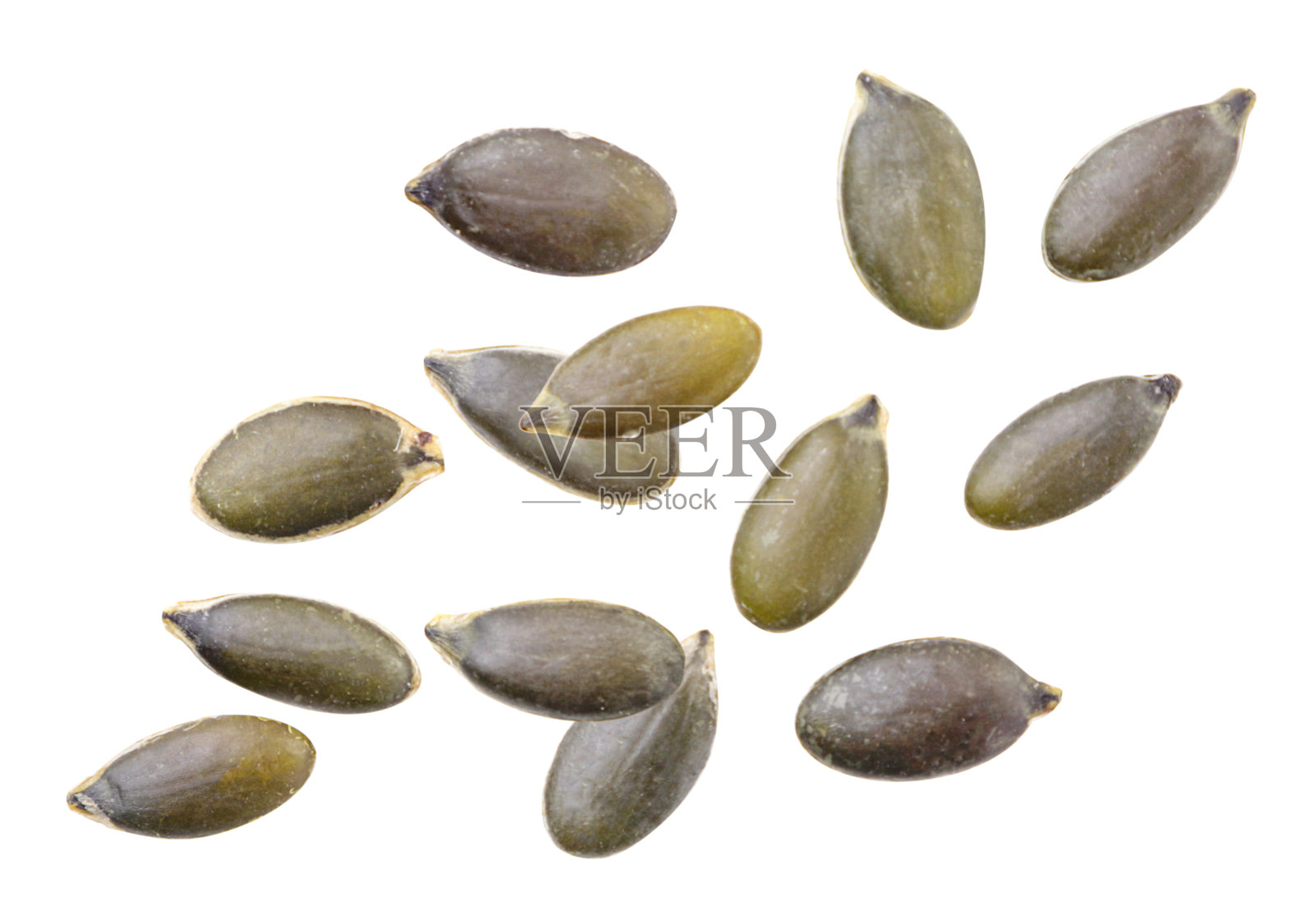 南瓜籽飞近白色。孤立的照片摄影图片