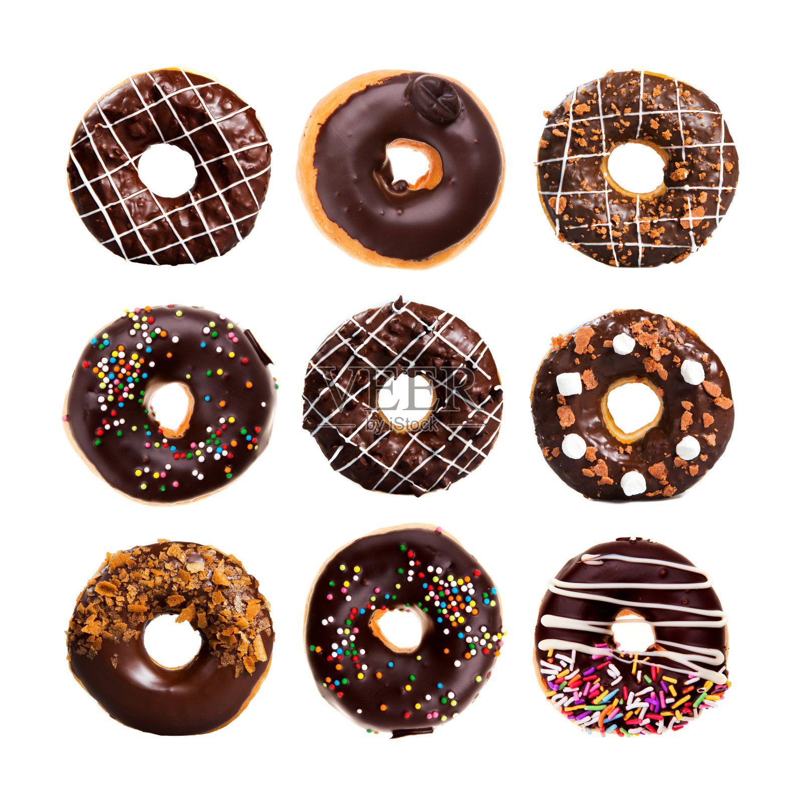 白色背景上的各种甜甜圈照片摄影图片