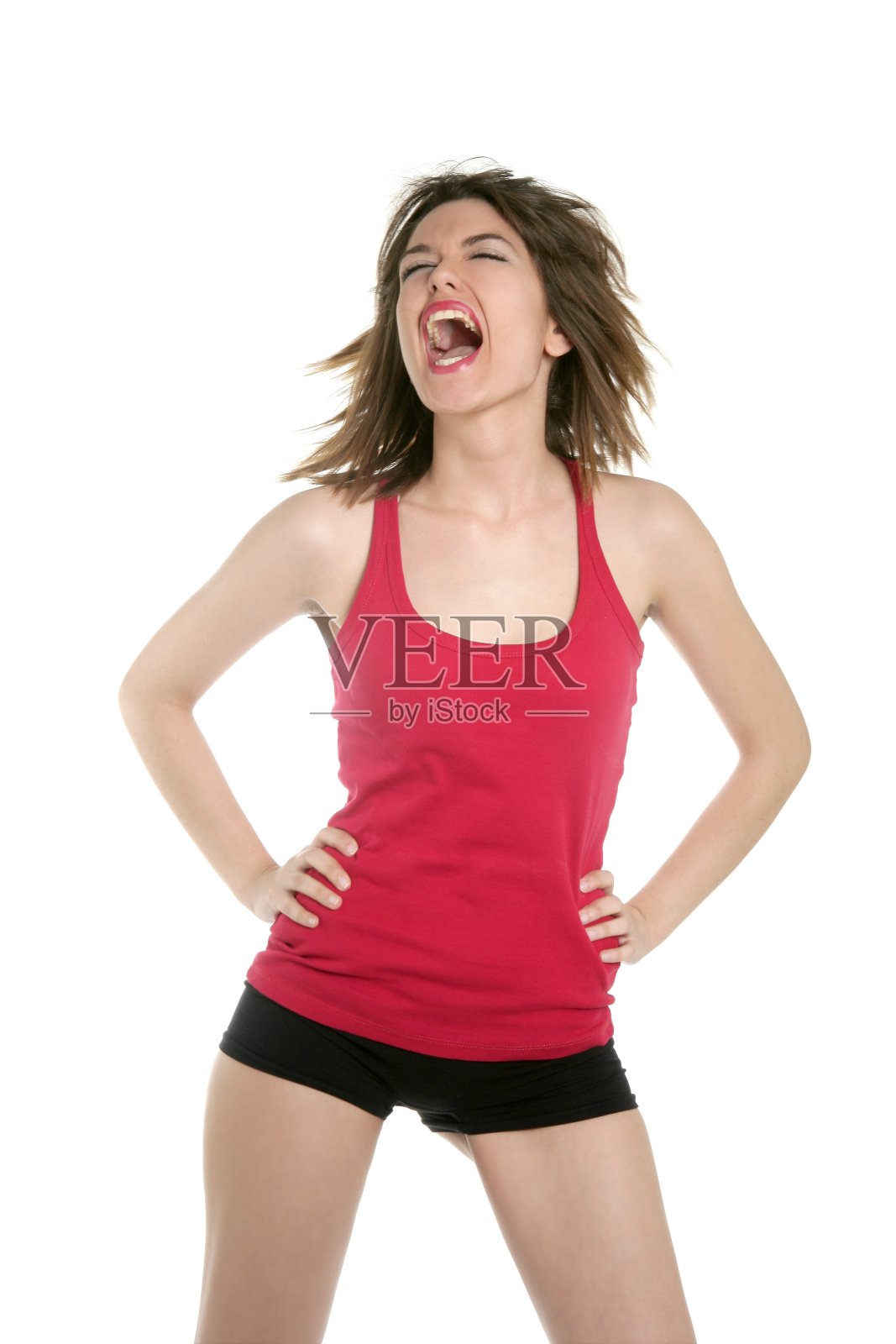 穿着性感短裤跳舞的年轻女子照片摄影图片