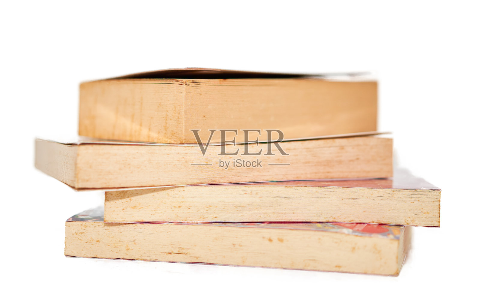 旧书堆孤立在白色上照片摄影图片