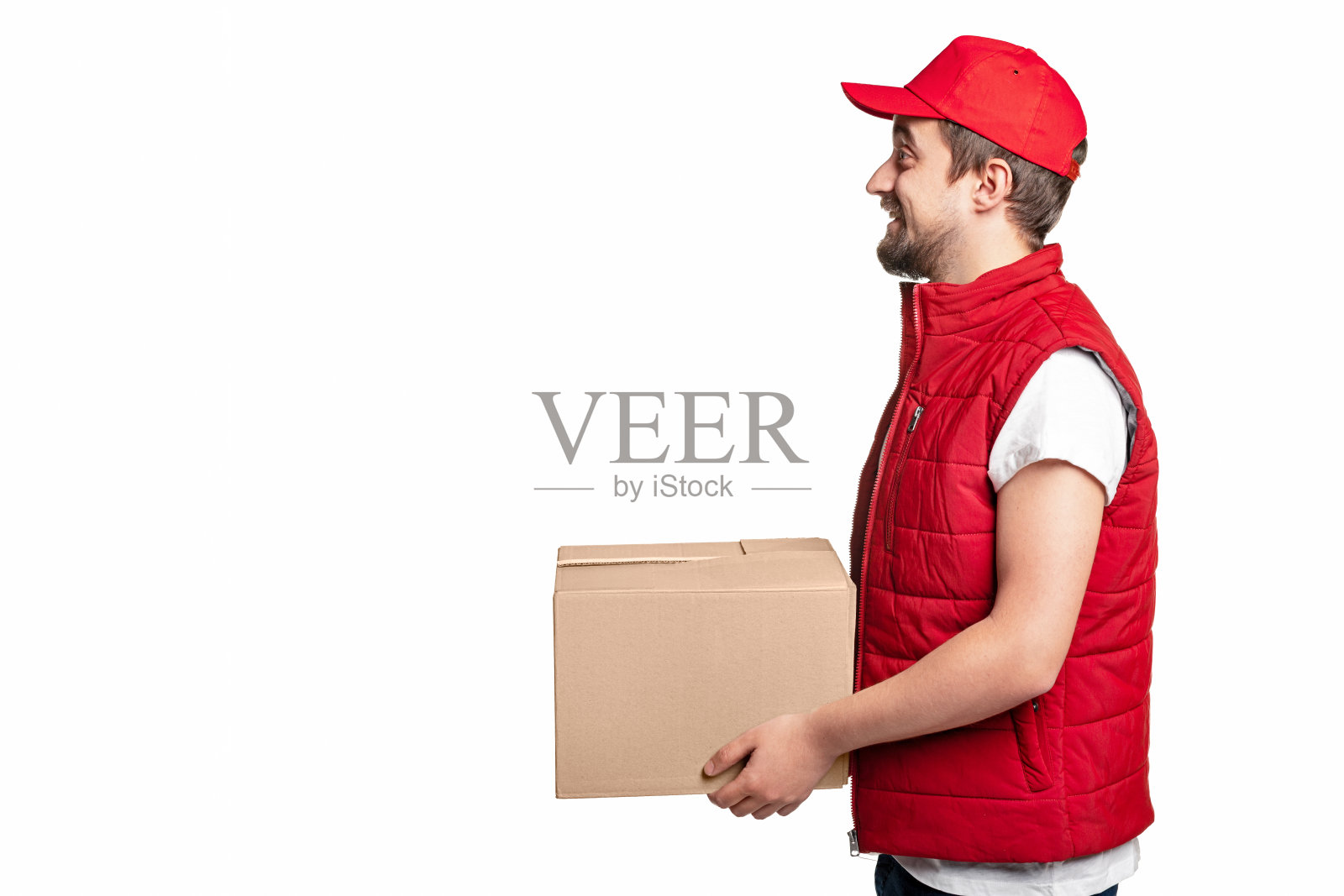 欢快的快递员投递纸箱照片摄影图片