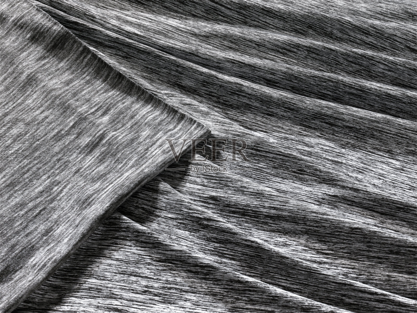 背景纹理，背景，图案，布褶蓝色。光泽完成折叠缎面织物是一种轻，有光泽的光泽和美丽的类型的织物，使最终的设计时尚和迷人照片摄影图片